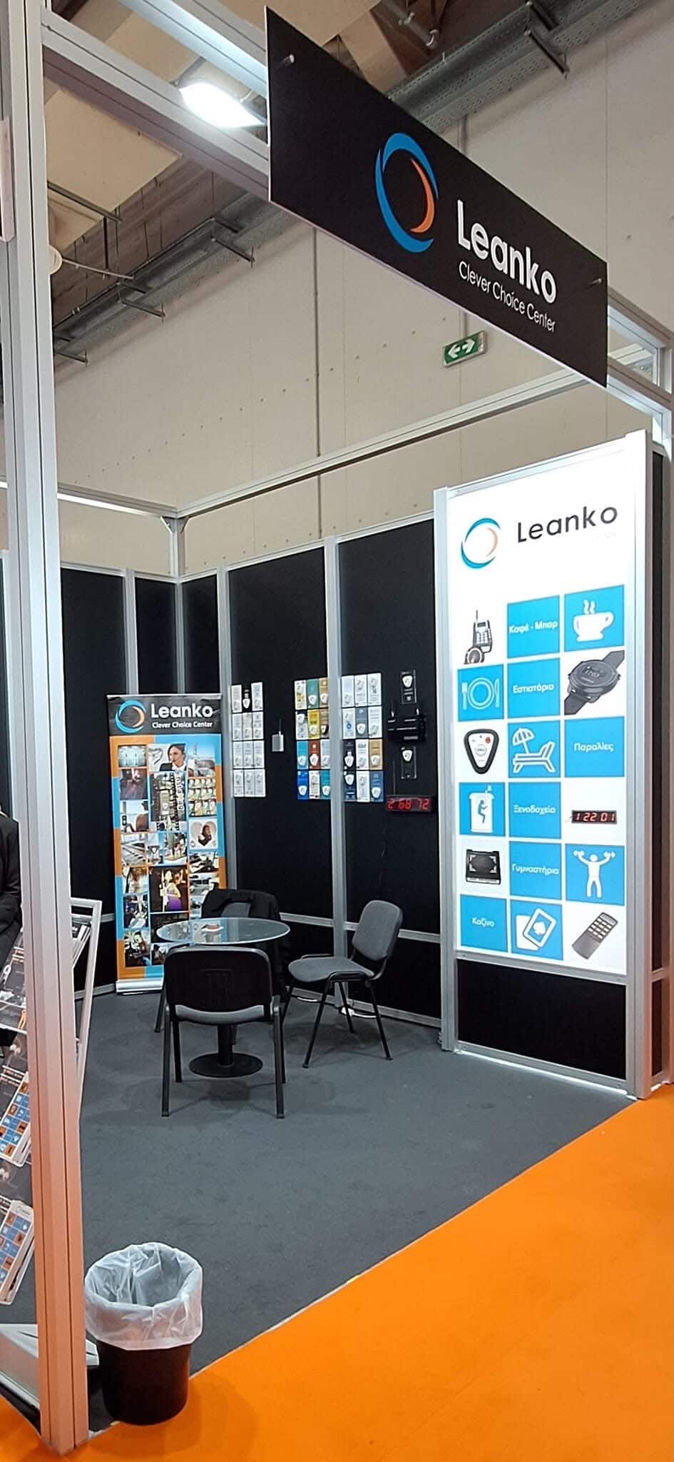Leanko booth at industry exhibition with team members engaging visitors